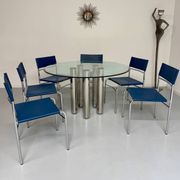 Round glass and metal dining table, Italian design from the 80s, vintage