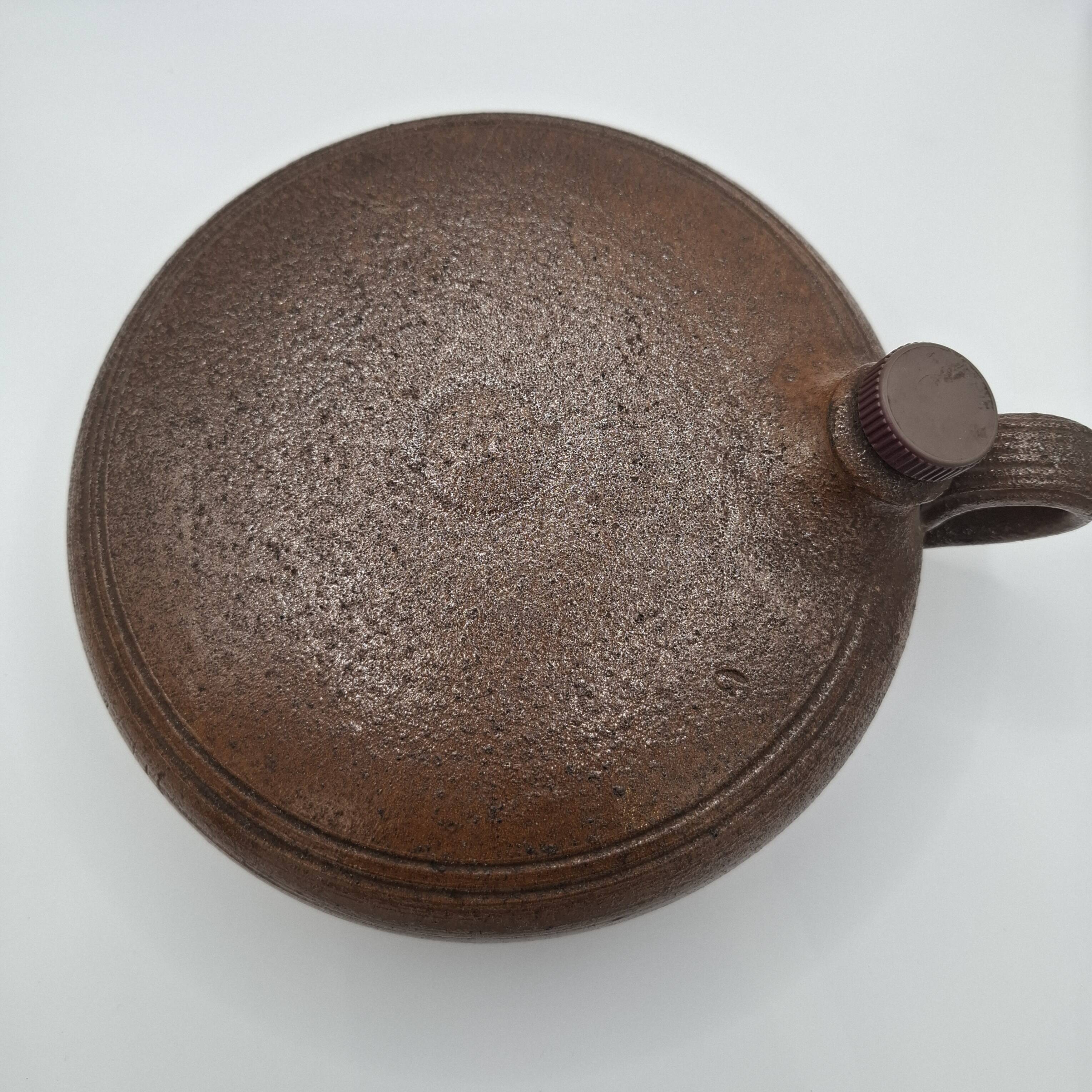 Stoneware hot water bottle, bed warmer, or round, flat bottle
