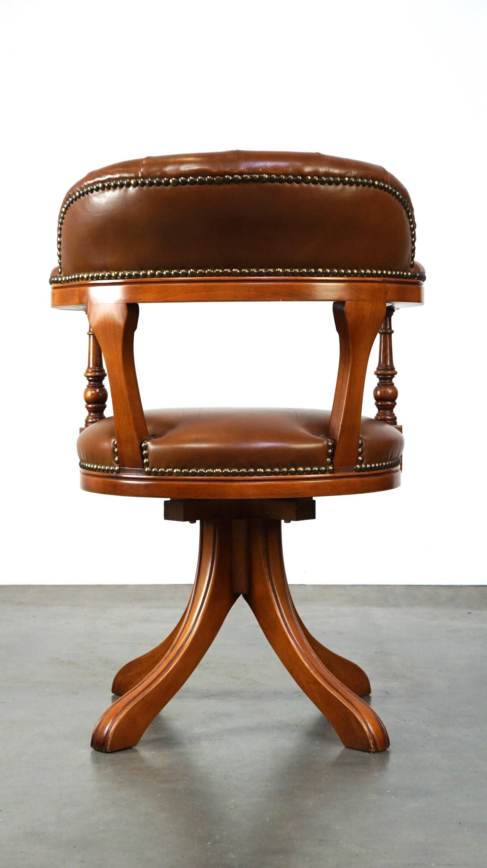 Swivel English style Chesterfield armchair/office chair in brown cowhide