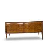Veneered burl walnut chest of drawers with light warm brown glass top