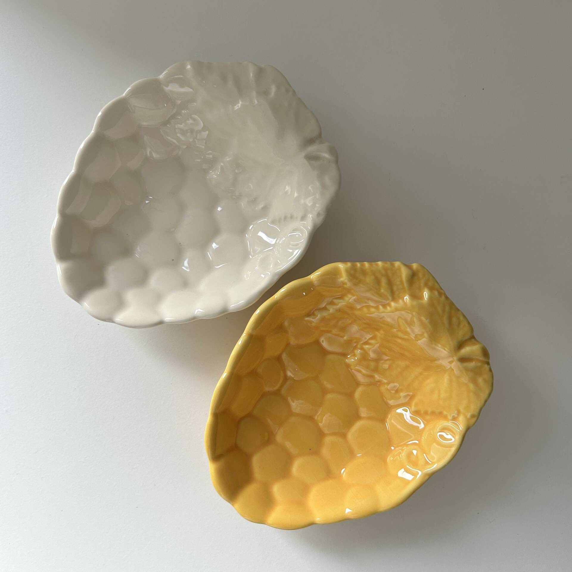 2 grape bowls in slipware