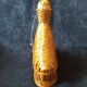 Vintage wicker and braided bamboo bottle