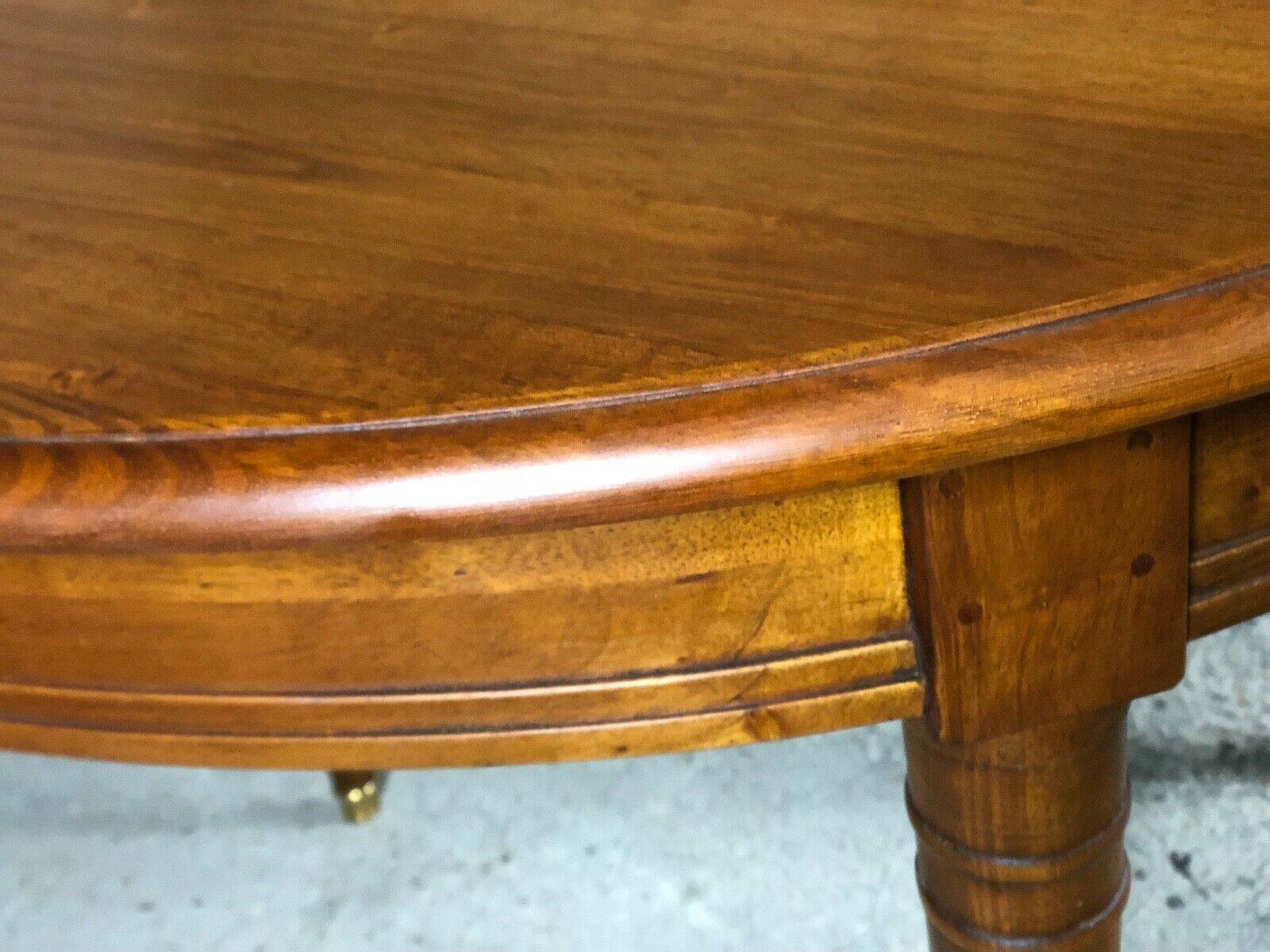 Oval walnut table with 6 legs from 1m12 to 2.94 (4 extensions of 45.5 cm)
