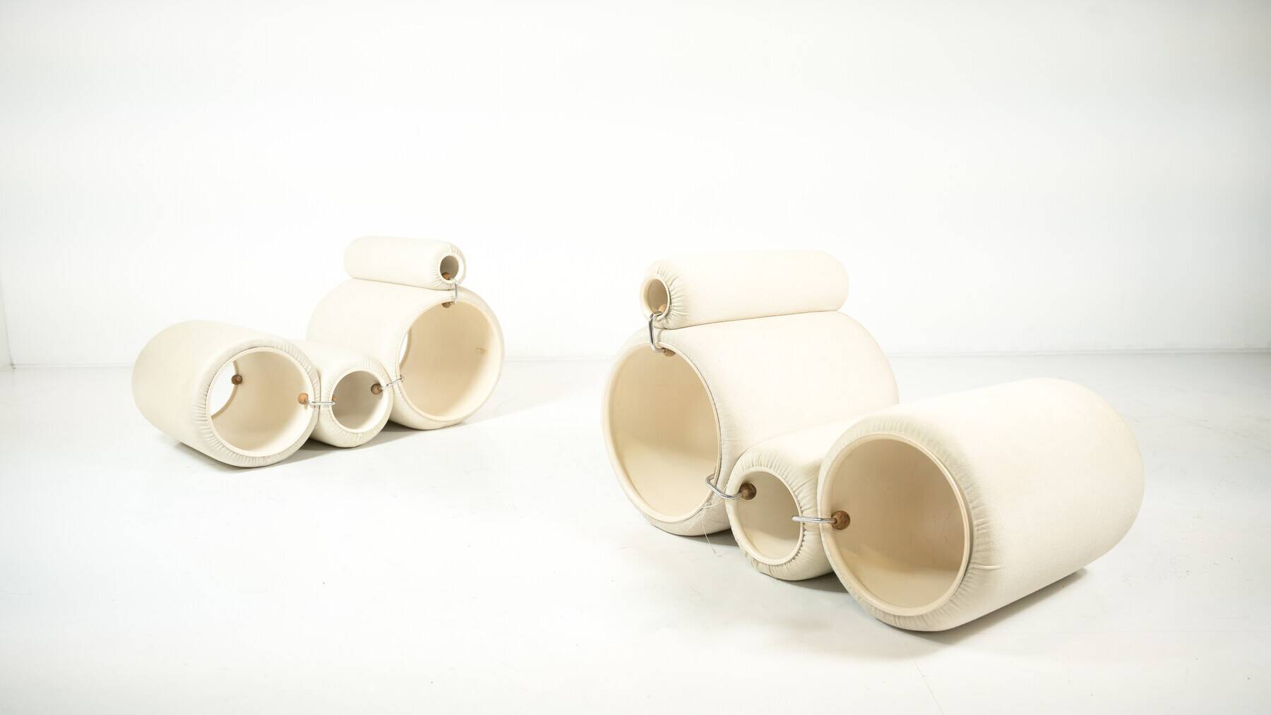Pair of Tube Armchairs by Joe Colombo for Flexform, first edition.