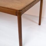 Coffee table in teak with brown ceramic tiles of danish design from the 1960s.