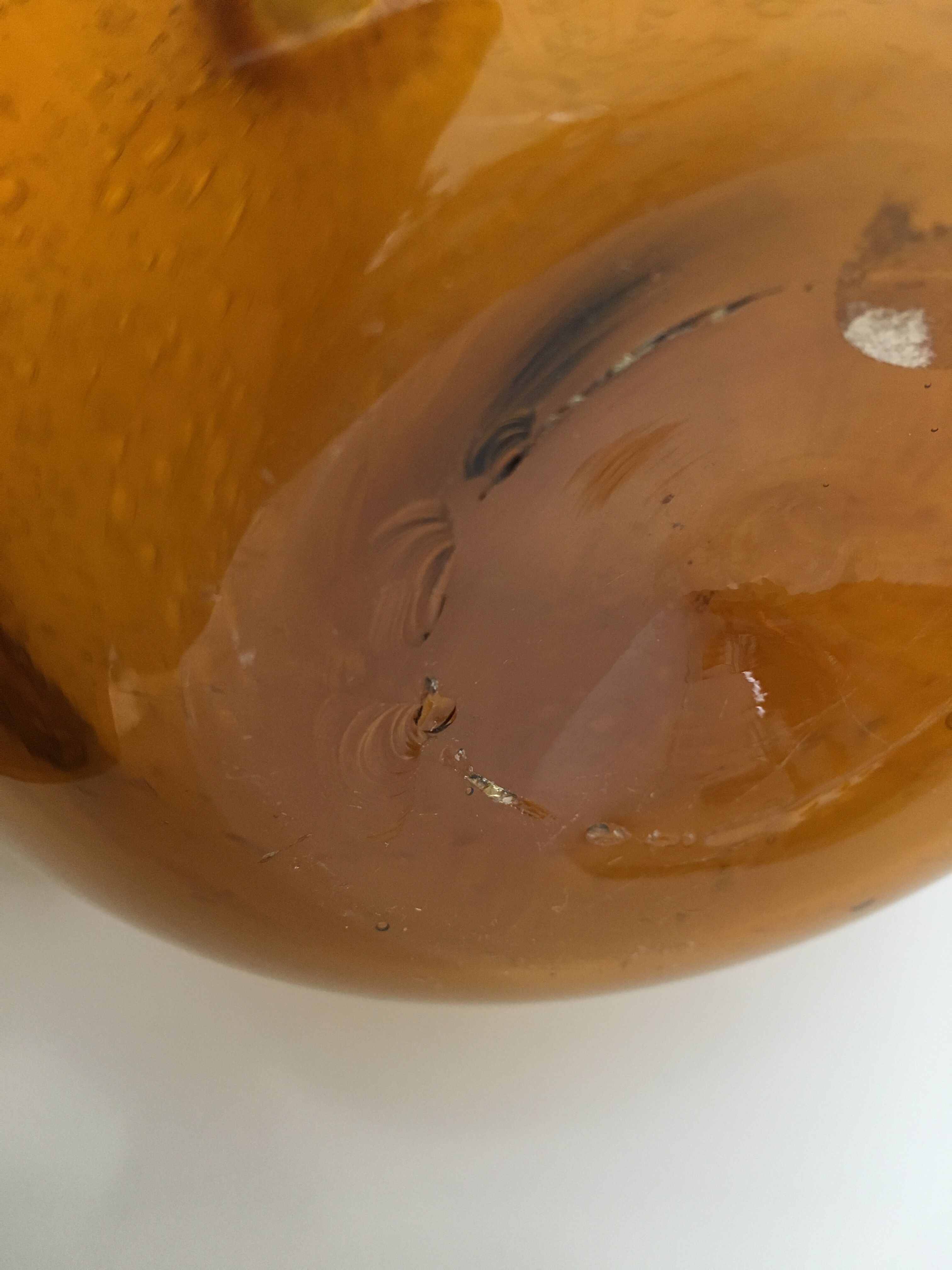 Biot blown glass amber bottle