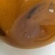 Biot blown glass amber bottle