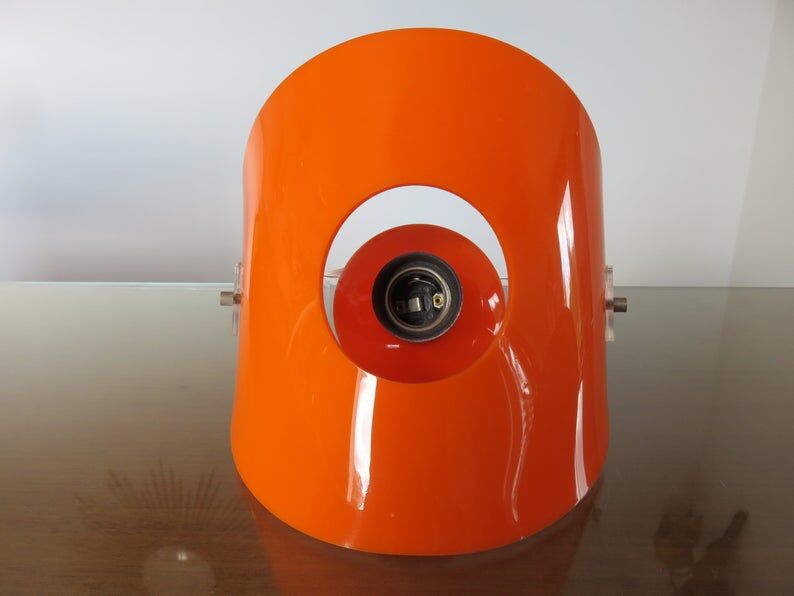 Pair of sconces in orange 70s perspex