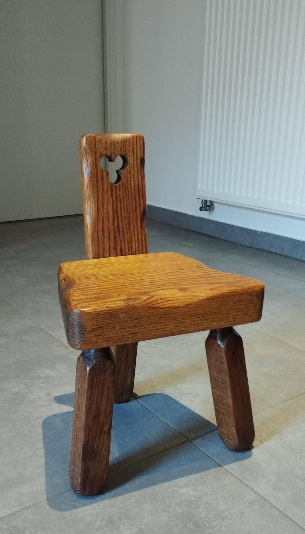 Tripod chair for children, Scandinavian brutalist chalet design.