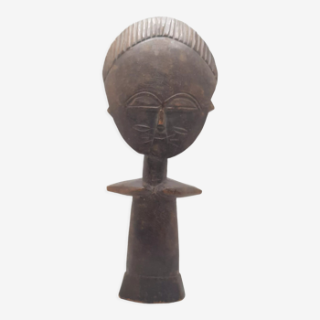 Hatd carved wooden fertility doll
