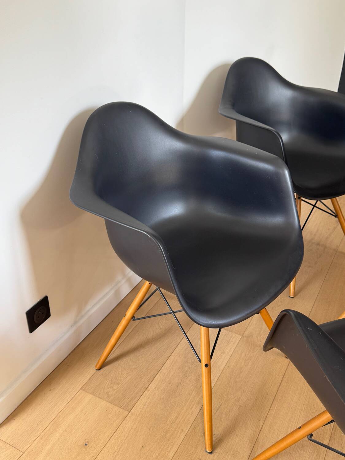 Eames plastic armchairs