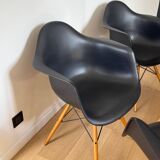 Eames plastic armchairs