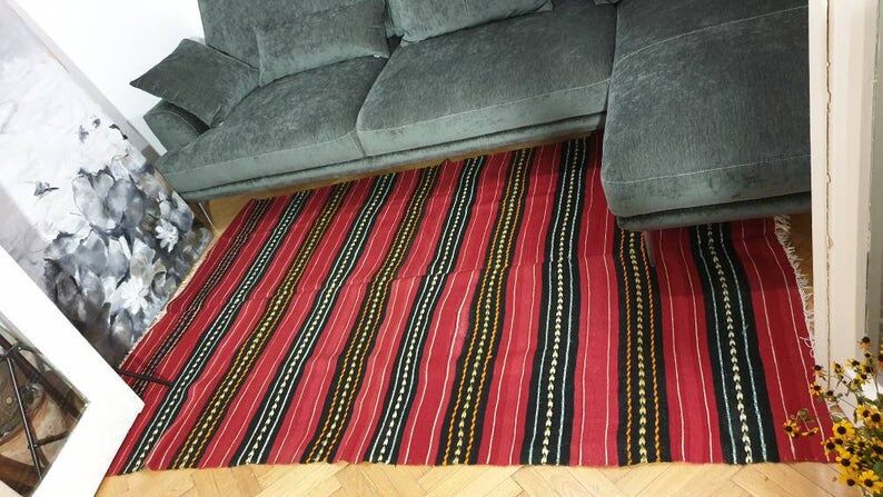 Hand-woven red wool rug