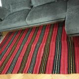 Hand-woven red wool rug