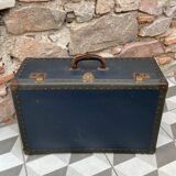 Midnight blue suitcase of representative 30s