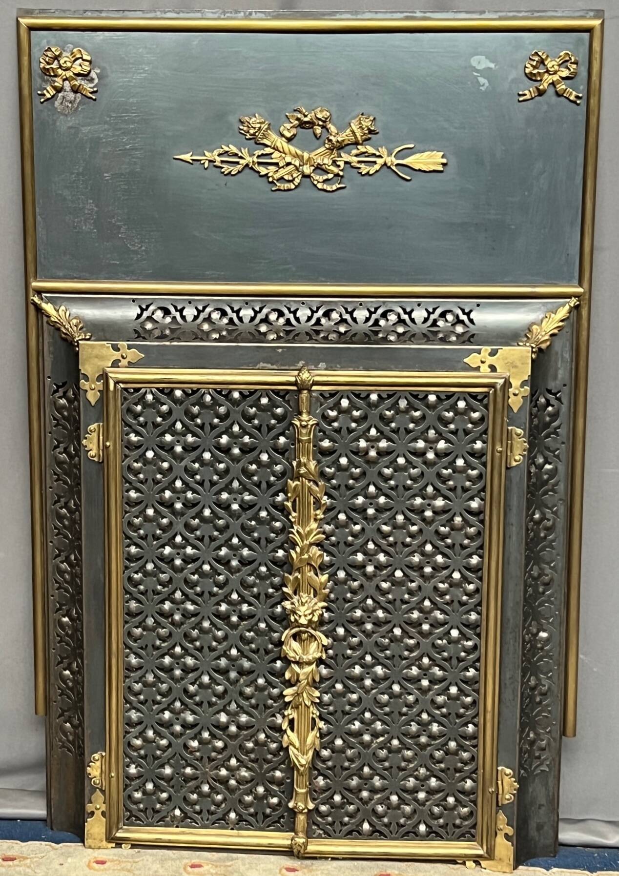 Fireplace screen. Bronze, copper, metal, gilding.