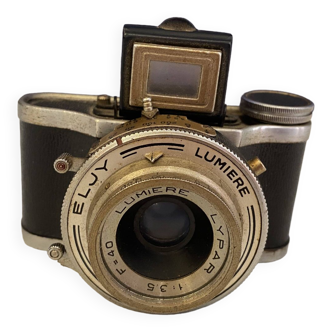 Ancien appareil photo eljy lumiere f.40 des années 50 avec objectif lypar