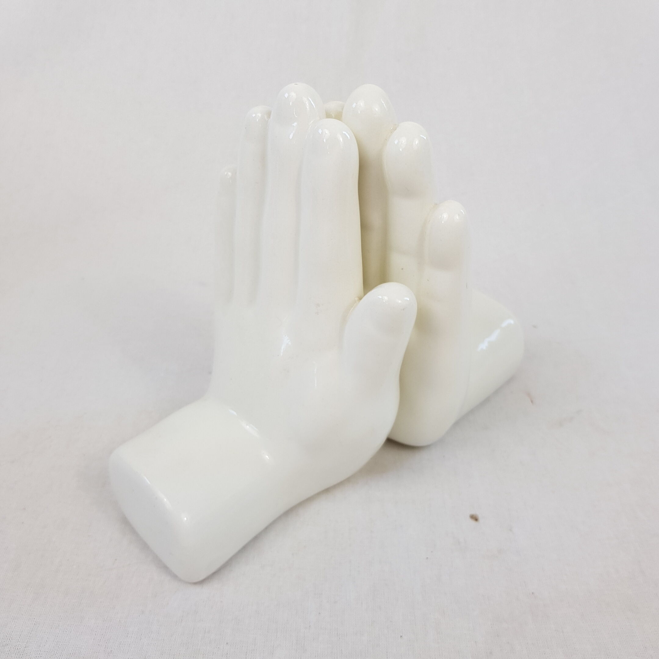 White ceramic book greenhouse representing hands 1980