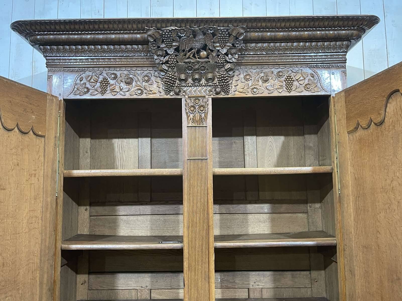 19th-century Norman wedding armoire in blonde oak.