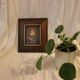 Portrait painting with wooden frame and gilding