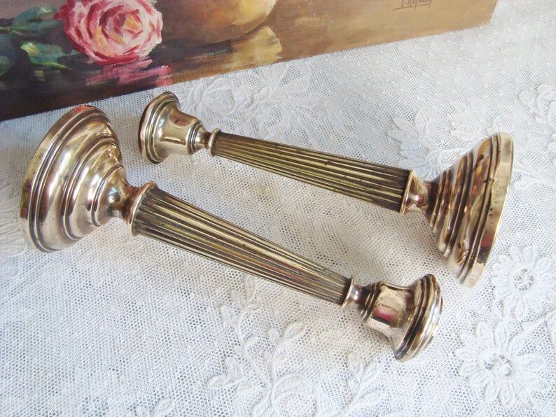 Pair of very old brass candlesticks