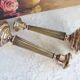 Pair of very old brass candlesticks
