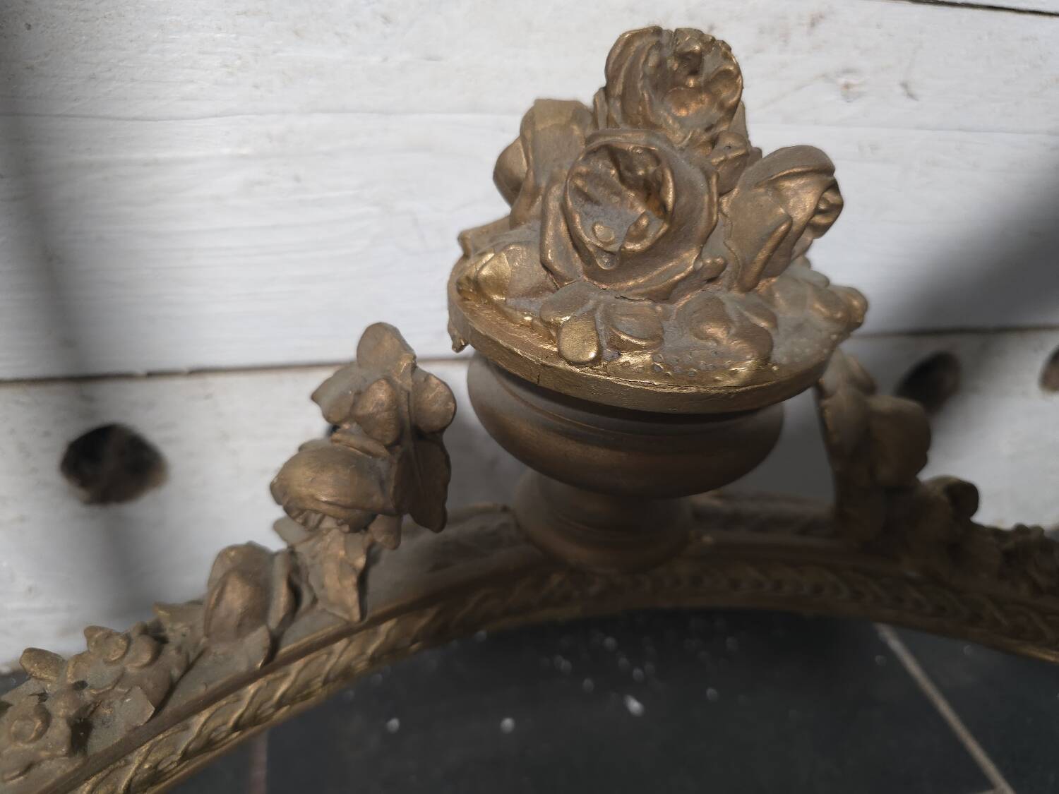 Louis XVI style console in gilded wood with a marble top.