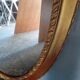 Miroir ovale 134cm bois et stuc doré debut XXem