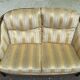 Two-seater Louis XVI canapé in golden beige fabric and curved solid wood.