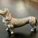 12 old dog-shaped Etains du Manoir knife holders