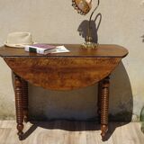Antique walnut table with drop-leaf doors