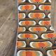 1970 orange pattern / chaise longue / vintage camp bed in metal and fabric