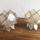 Lotus flowers in mother-of-pearl sconces