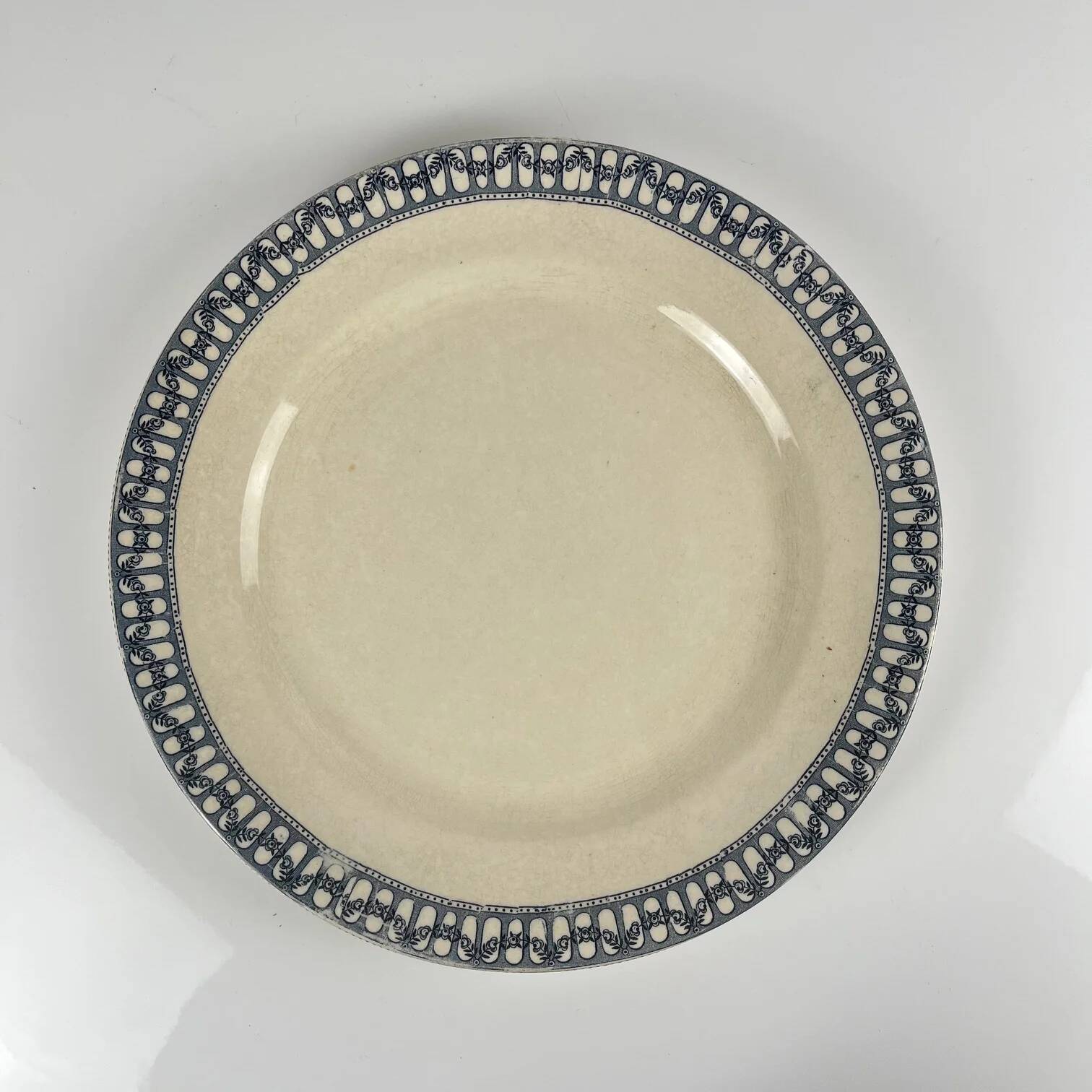 Round plate made of iron earth from Salins, late 19th century - early 20th century.
