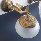 Pair of antique bronze wall sconces