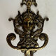 Antique hook in gilded bronze