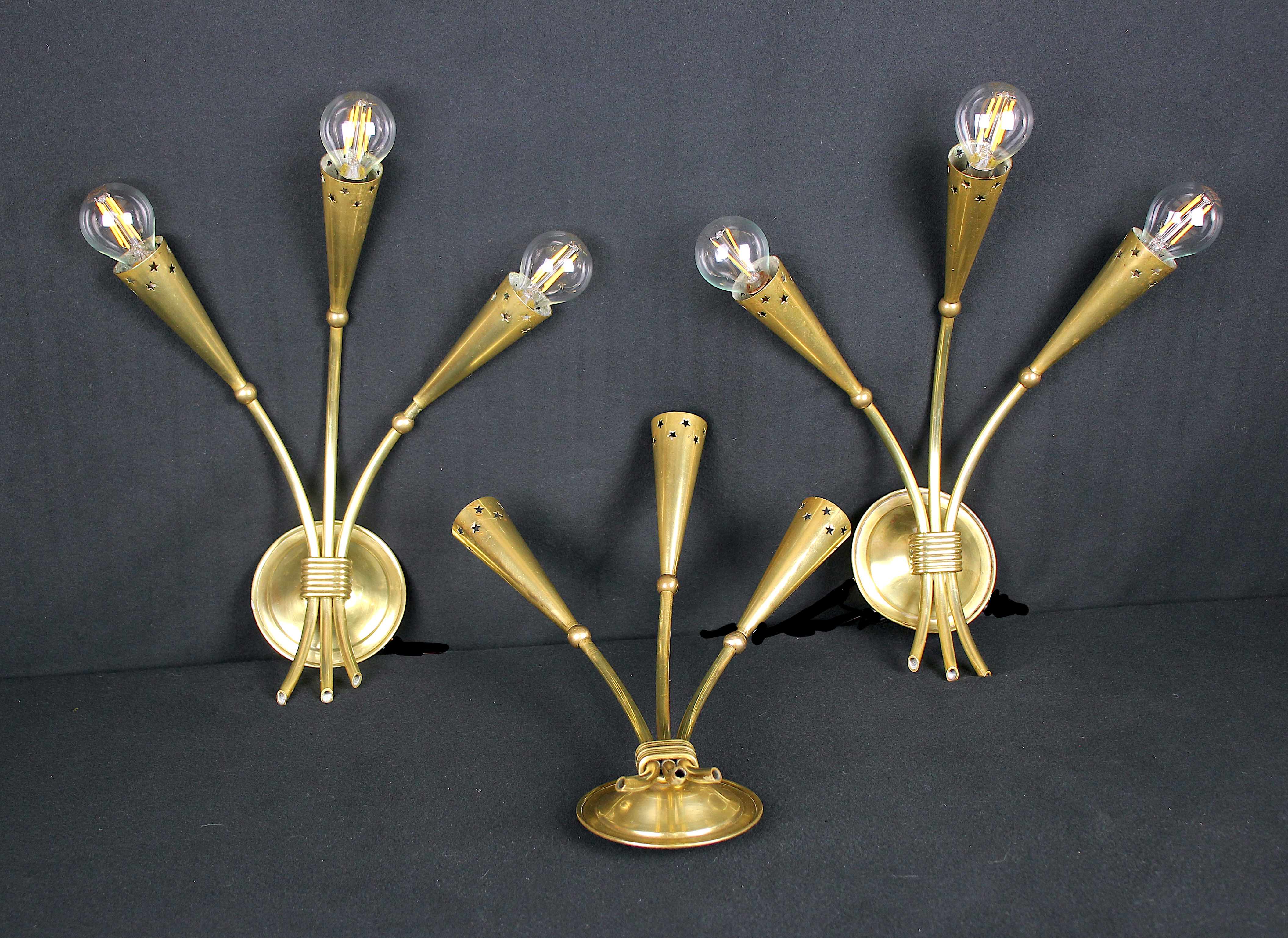 Three gilded brass sconces, Maison Lunel, France, 1950's
