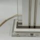 Vintage table lamp in lucite and brass, cream lacquered column.