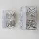 Pair of modernist 1970s glass and chrome metal wall sconces