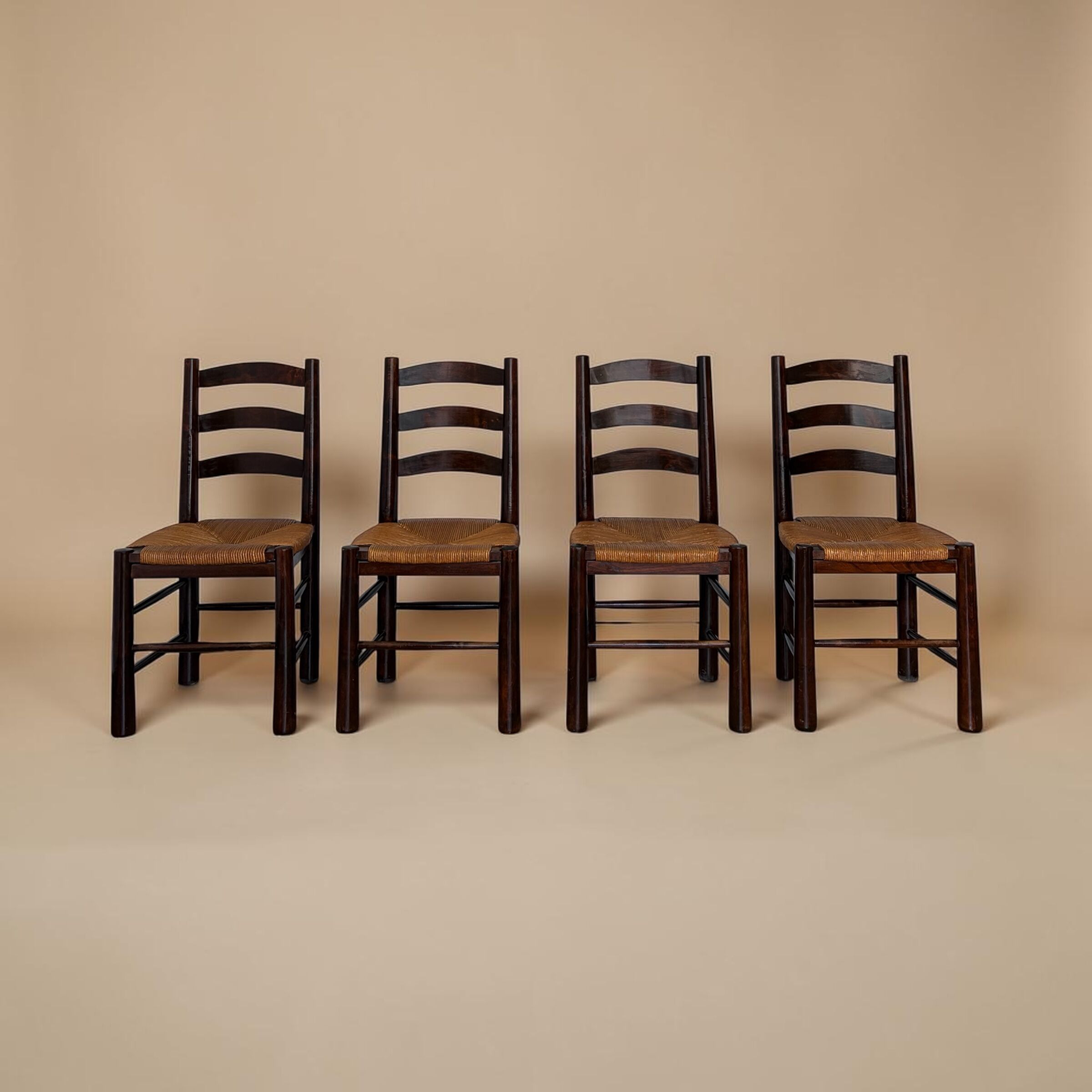 Rustic chairs attributed to Georges Robert.