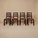 Rustic chairs attributed to Georges Robert.
