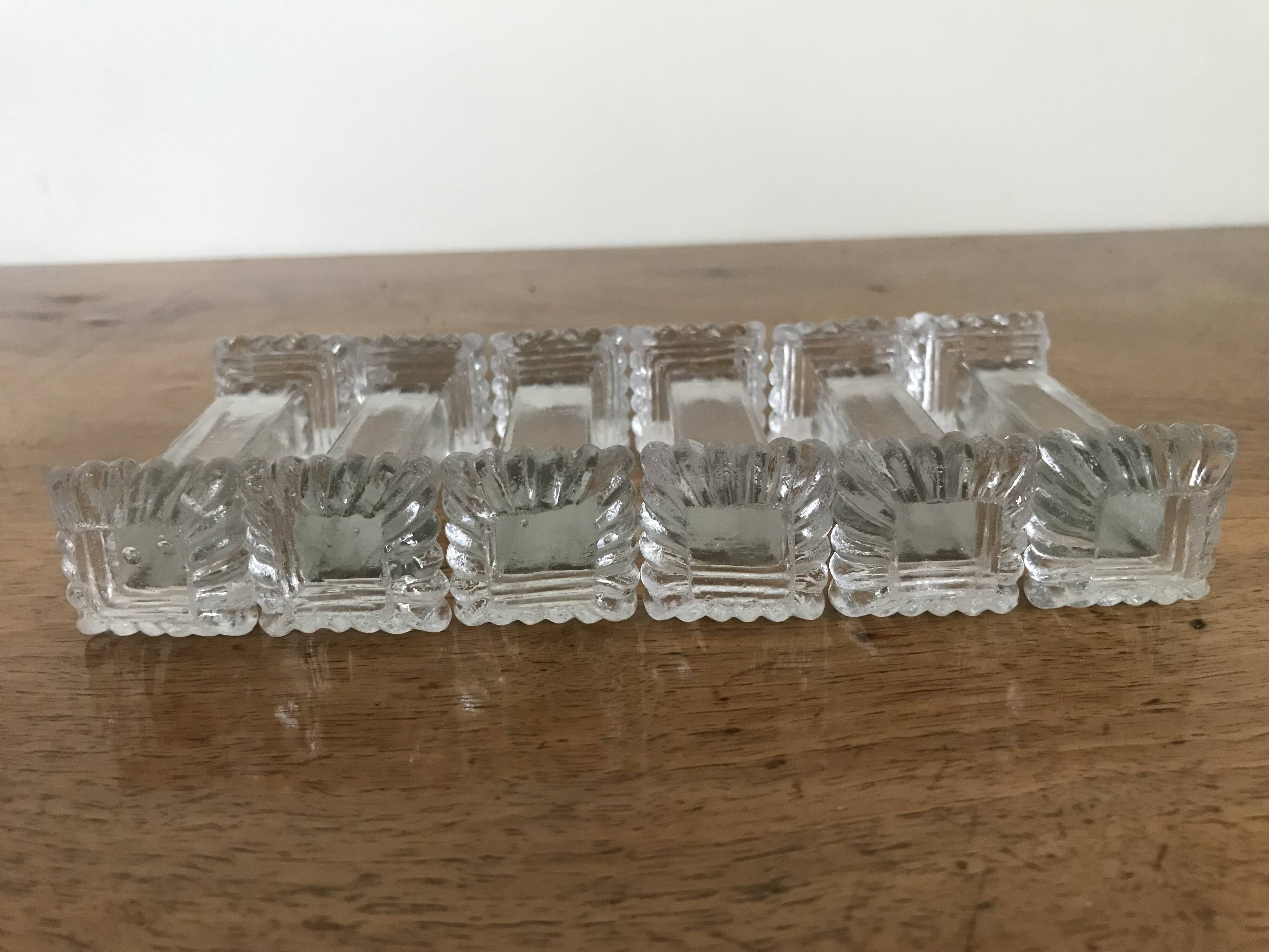 Set of six Art Deco glass knife holders