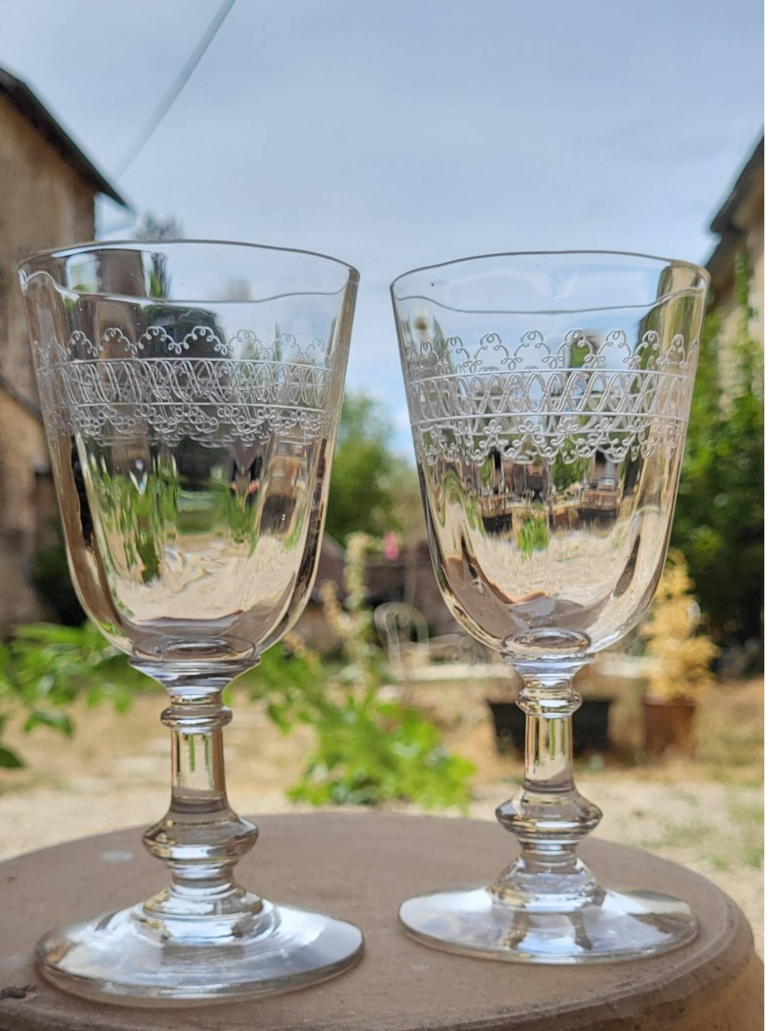 6 engraved glass wine/water glasses from the early 20th century.