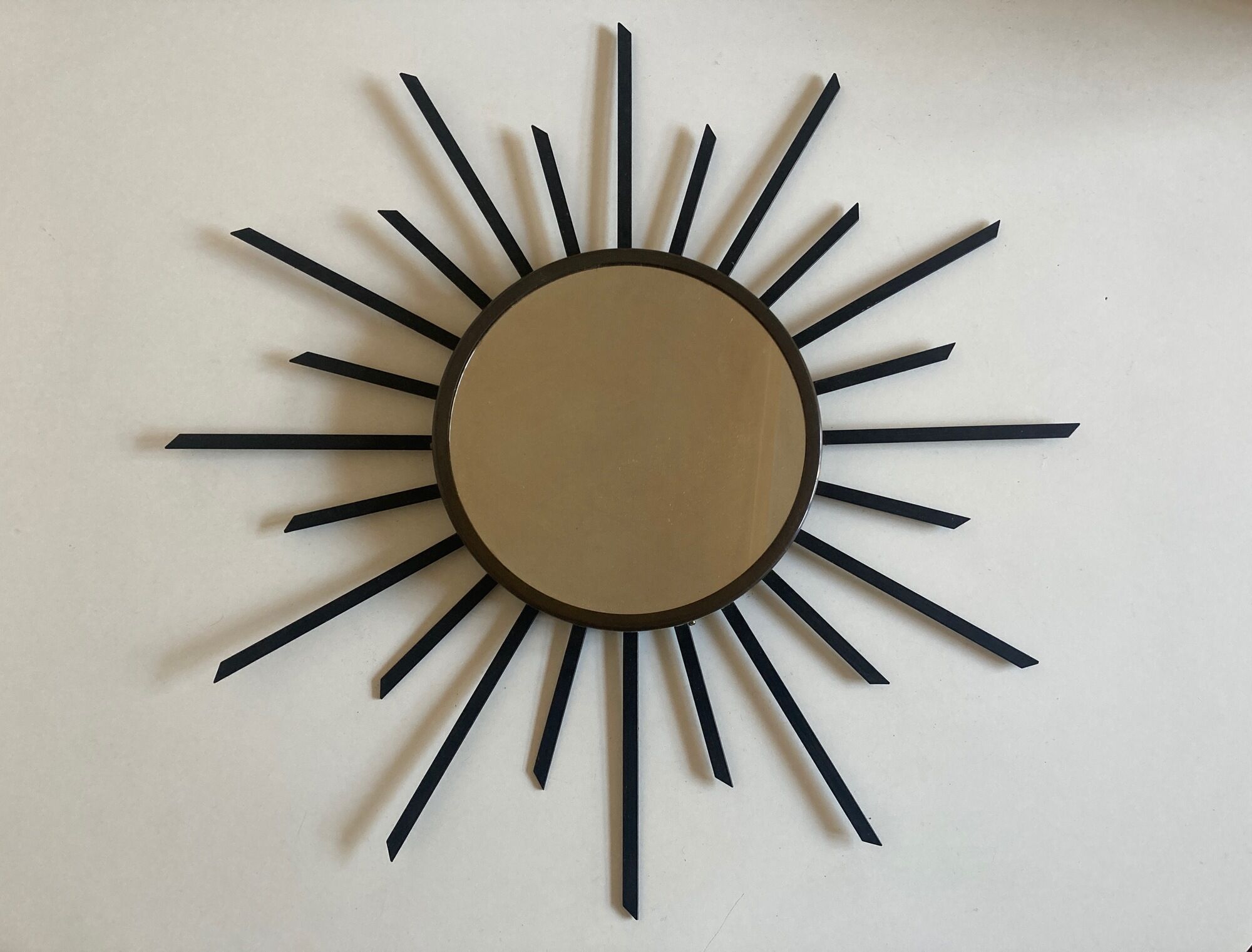 Sun mirror 1960 in patinated brass and black rays 50cm