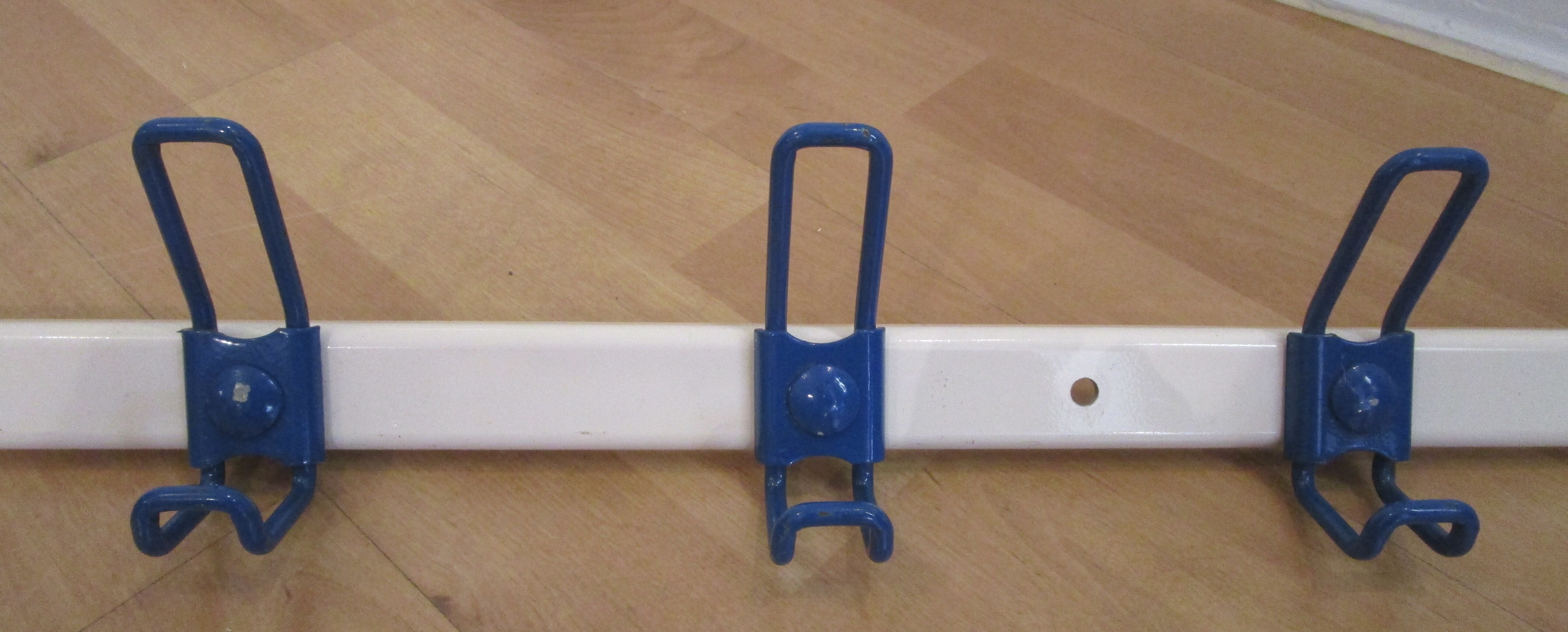 White and blue lacquered steel wall coat holder