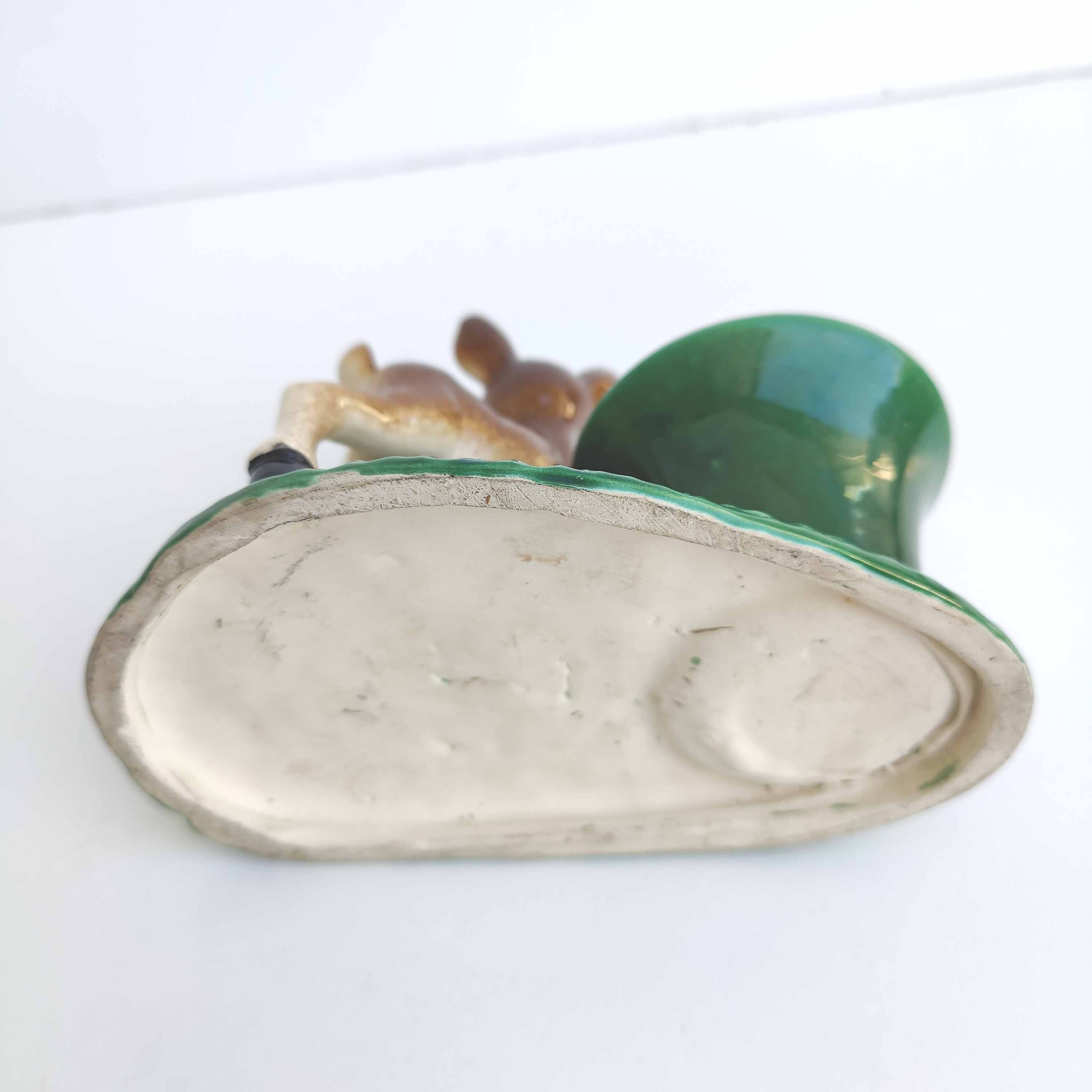 Old empty inkwell ceramic fawn pocket