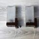 Pair of vintage wall sconces with etched glass and pull switch from the 1970s.