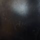 Fauteuil club noir/gris en cuir de mouton