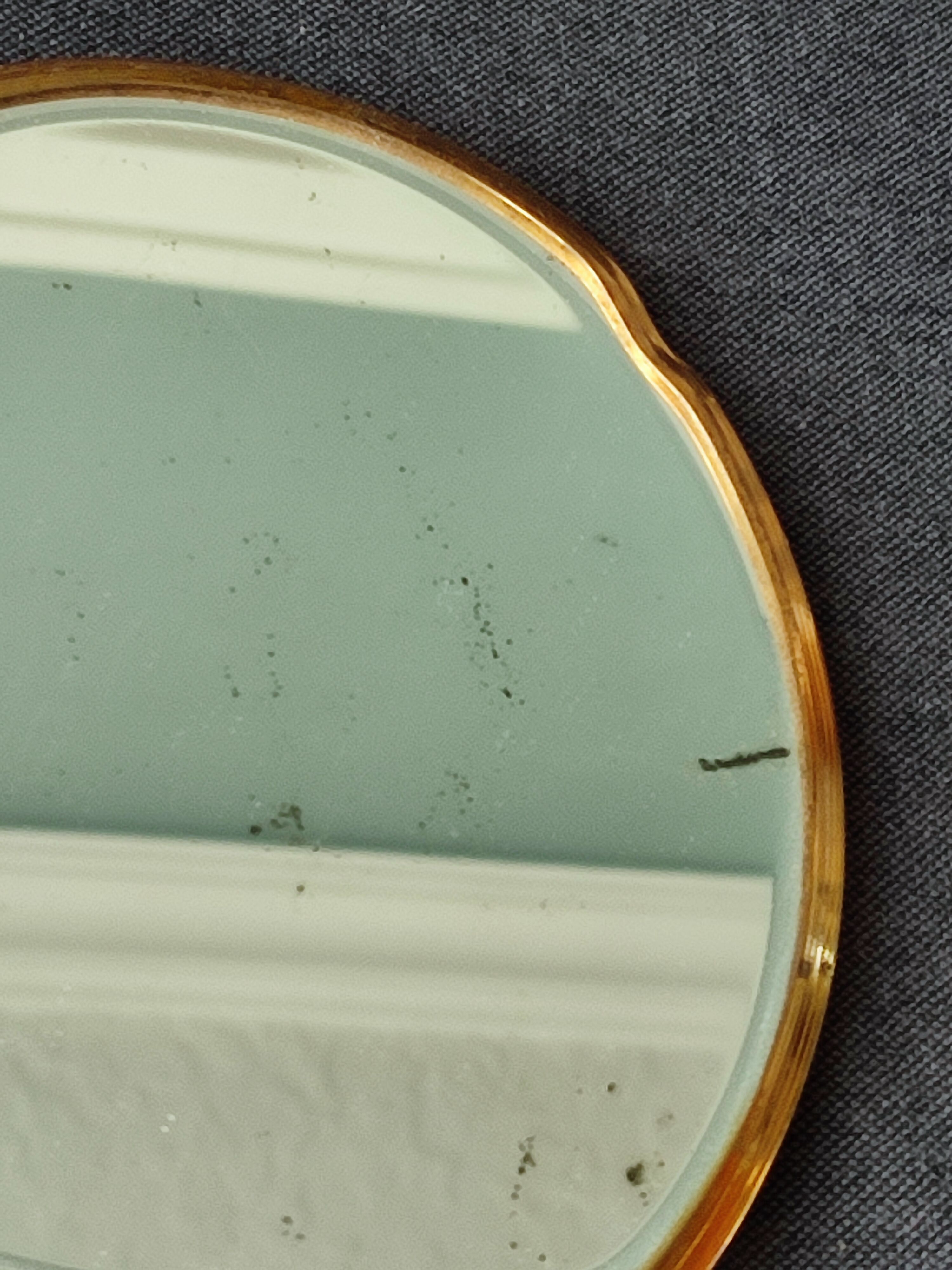 Miroir a main biseauté de taille moyenne art deco
