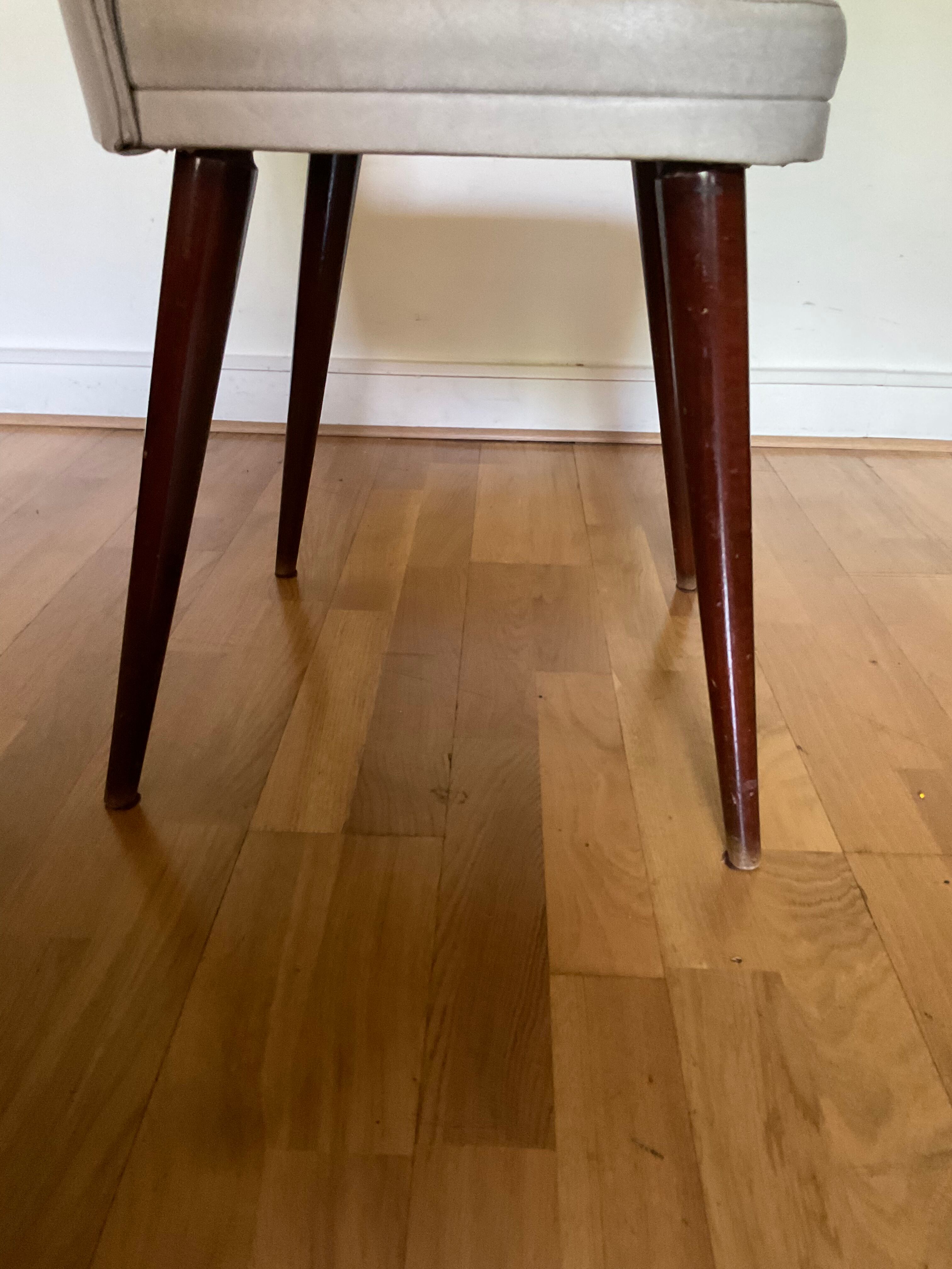 Pair of vintage mahogany and skai chairs